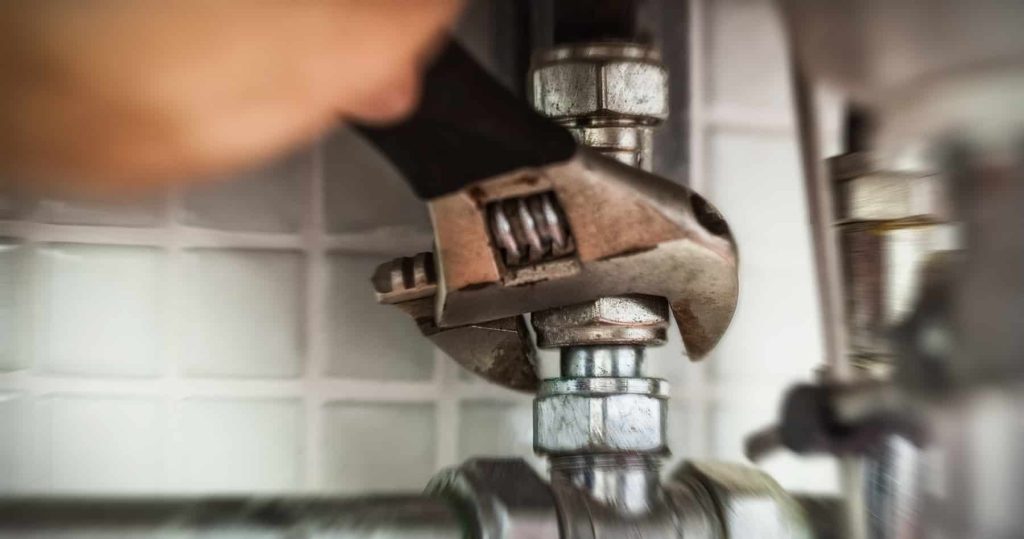 A plumber handling a plumbing repair in Chicago